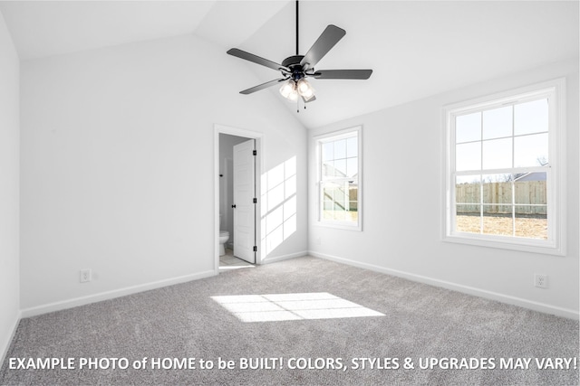 unfurnished bedroom featuring lofted ceiling, carpet, ensuite bath, and baseboards