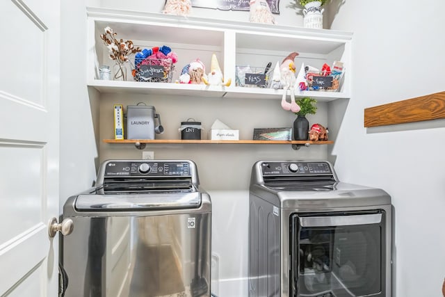 laundry area with laundry area and independent washer and dryer