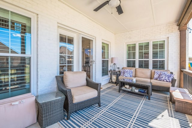 exterior space featuring ceiling fan and an outdoor living space