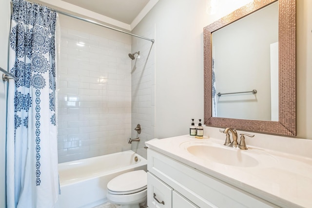 bathroom featuring toilet, shower / tub combo with curtain, and vanity