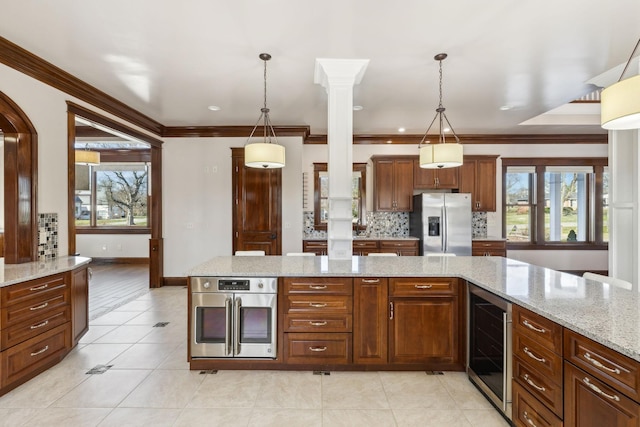 kitchen featuring stainless steel fridge with ice dispenser, wine cooler, backsplash, crown molding, and a wealth of natural light