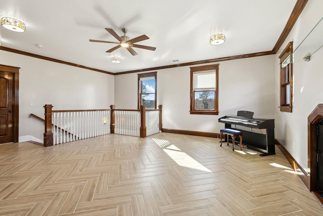 unfurnished room featuring crown molding and baseboards