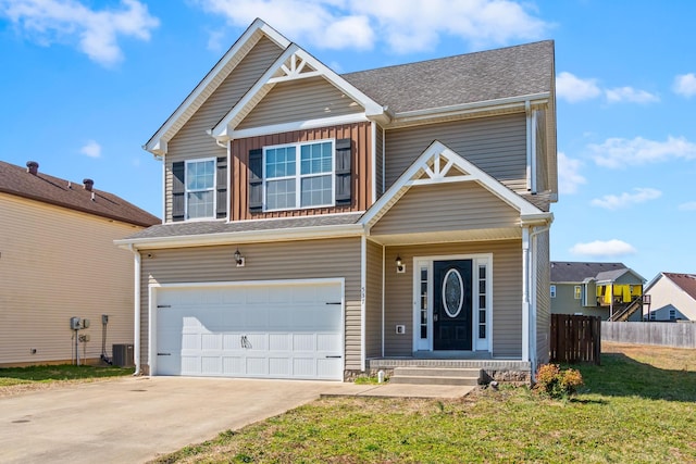 view of front of property with central air condition unit, an attached garage, a front yard, fence, and driveway