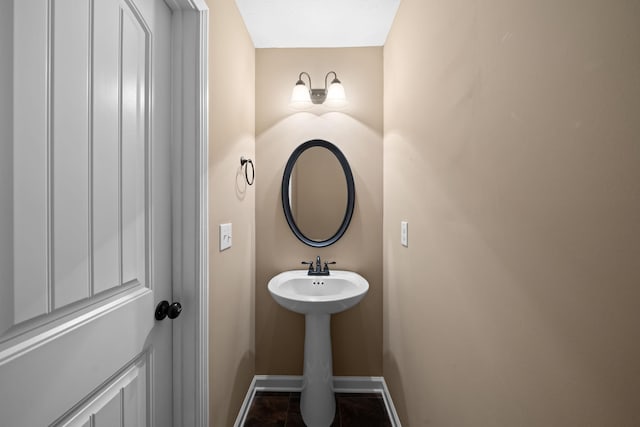 bathroom featuring baseboards