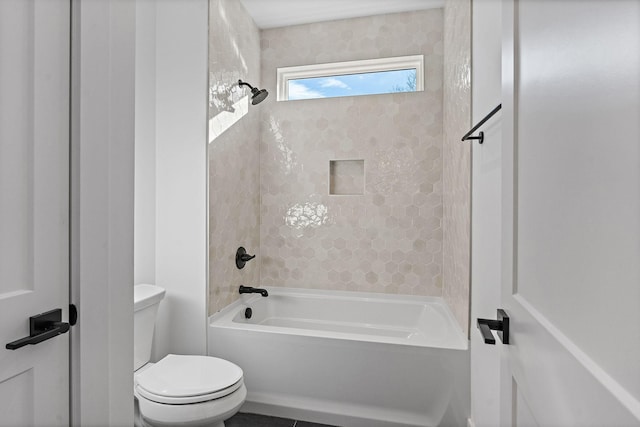 full bathroom with shower / bath combination and toilet