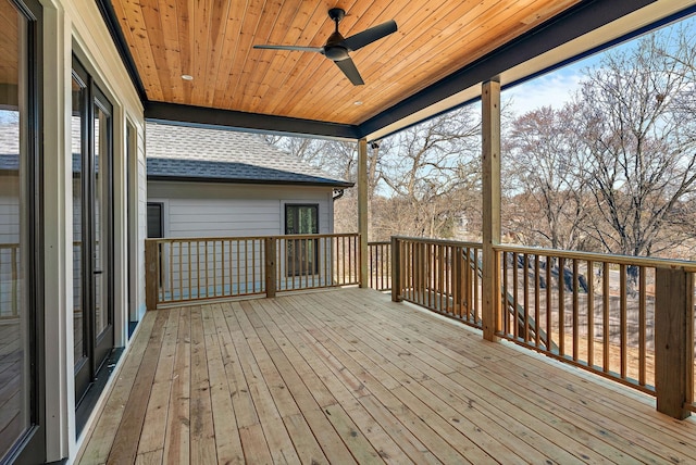 wooden terrace featuring ceiling fan