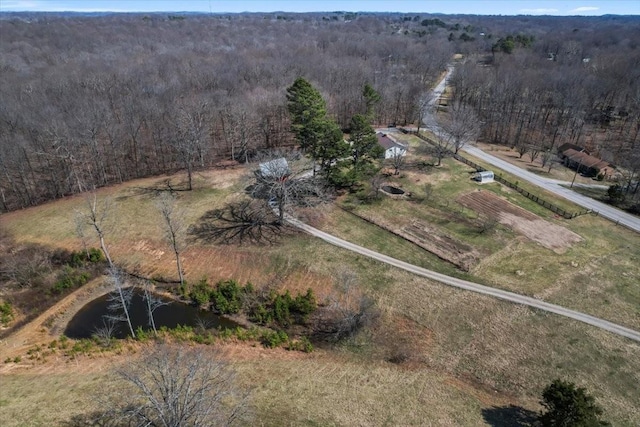 aerial view with a wooded view