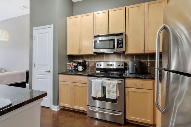 kitchen with stainless steel appliances, finished concrete floors, light brown cabinets, and tasteful backsplash