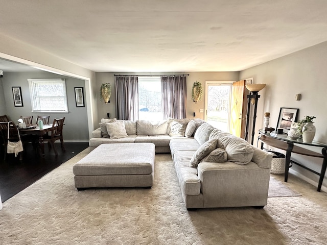 living room featuring baseboards