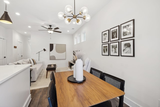 dining area with baseboards, dark wood finished floors, a ceiling fan, and recessed lighting