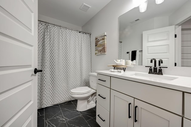 bathroom featuring toilet, marble finish floor, vanity, and visible vents