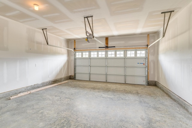 garage featuring baseboards