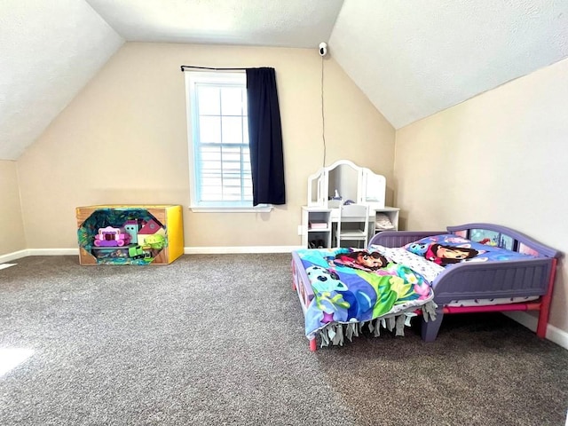 carpeted bedroom featuring lofted ceiling, a textured ceiling, and baseboards