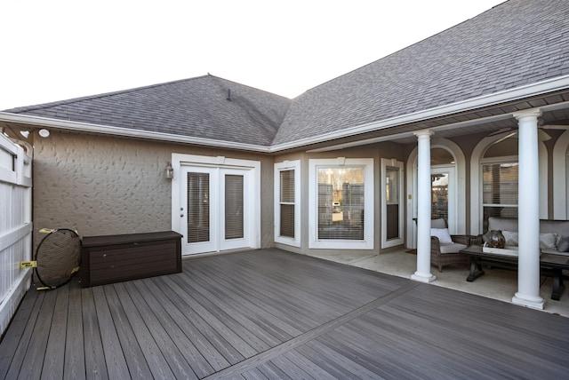 wooden deck featuring french doors