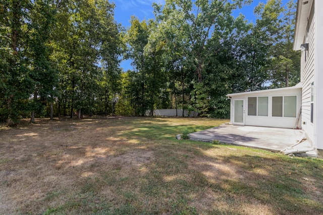 view of yard with a patio area and fence