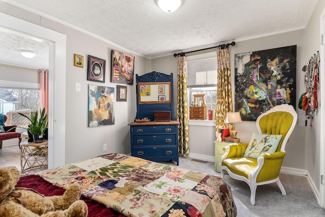 carpeted bedroom featuring crown molding, visible vents, baseboards, and a textured ceiling