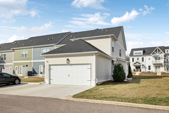 view of property featuring a shingled roof, concrete driveway, a front yard, a garage, and a residential view