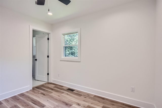 spare room with visible vents, baseboards, light wood-style flooring, ceiling fan, and recessed lighting