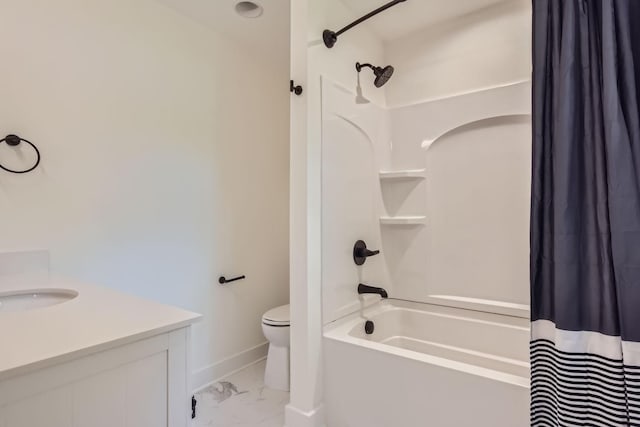 bathroom featuring baseboards, toilet, marble finish floor, shower / bath combination with curtain, and vanity