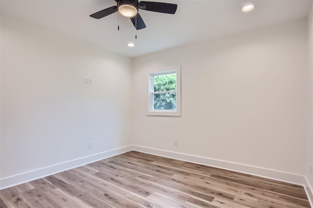 empty room featuring light wood-style floors, recessed lighting, baseboards, and a ceiling fan