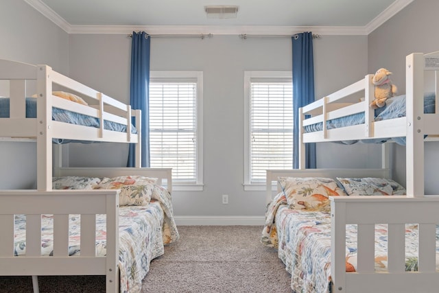 bedroom with carpet floors, multiple windows, visible vents, and ornamental molding