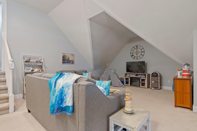 living room with lofted ceiling, light carpet, baseboards, and stairs