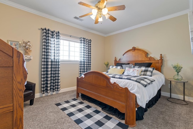 carpeted bedroom featuring ornamental molding, visible vents, and baseboards