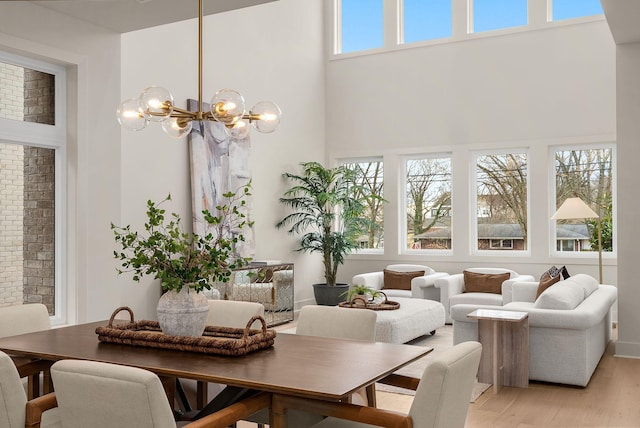 sunroom with a notable chandelier