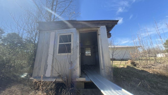 view of outbuilding featuring an outdoor structure