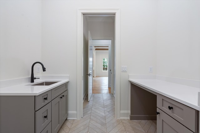 bathroom featuring vanity and baseboards