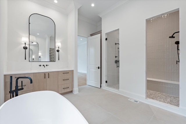 bathroom featuring a shower stall, visible vents, tile patterned flooring, and ornamental molding