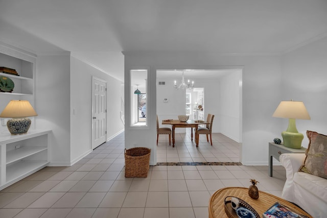 living area featuring baseboards, ornamental molding, light tile patterned flooring, and built in features