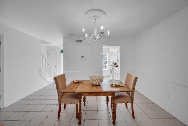 dining area with light tile patterned floors, a chandelier, visible vents, ornamental molding, and stairway