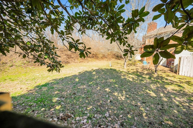 view of yard with fence