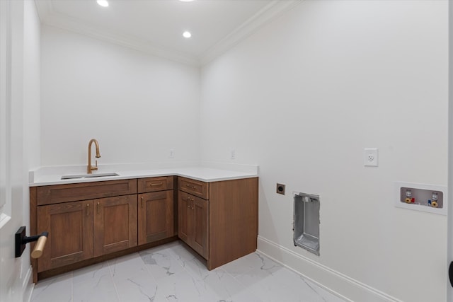 laundry room with hookup for a washing machine, marble finish floor, hookup for an electric dryer, crown molding, and a sink