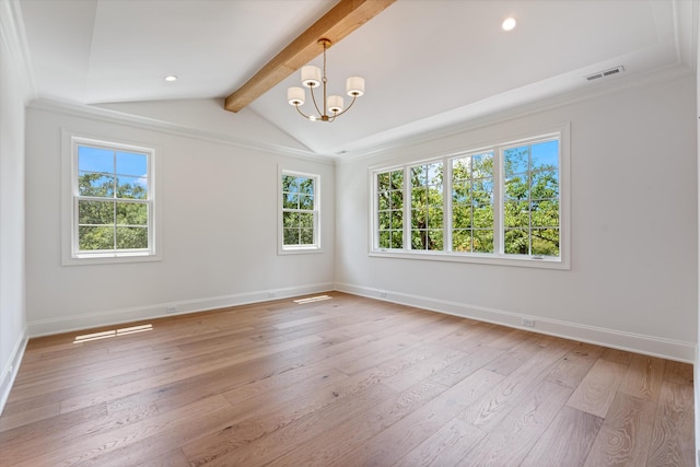 spare room with light wood-type flooring, a wealth of natural light, and baseboards