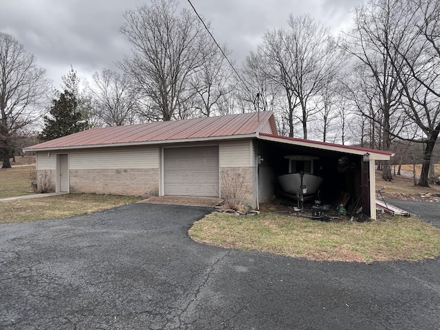 garage featuring driveway