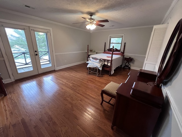 bedroom with access to outside, ornamental molding, and dark wood finished floors