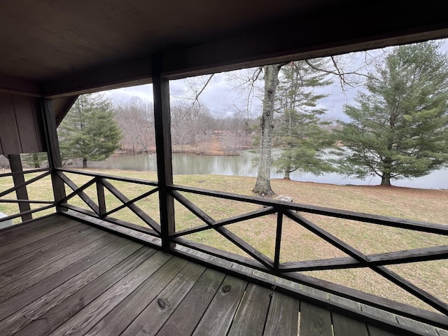 wooden terrace with a water view