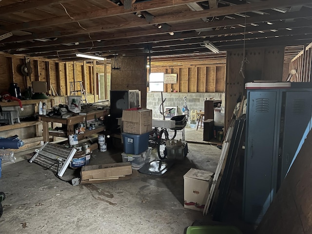 basement featuring concrete block wall