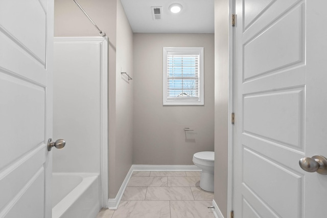 full bath with marble finish floor, visible vents, toilet, shower / tub combination, and baseboards