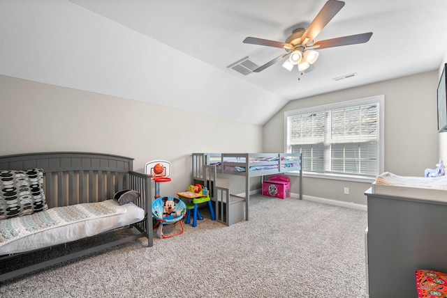 bedroom with lofted ceiling, carpet, visible vents, and baseboards