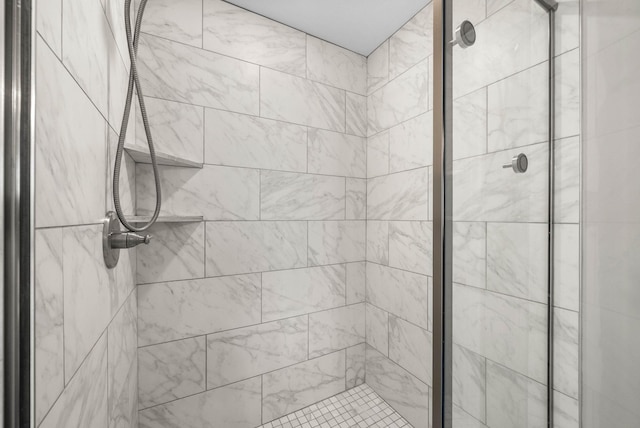 bathroom with a stall shower