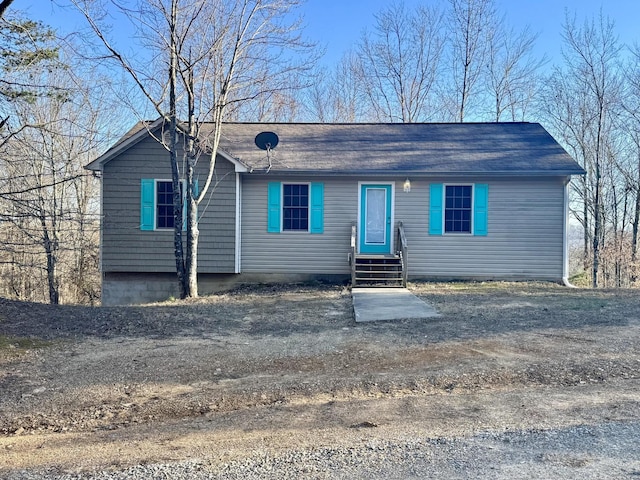 single story home featuring entry steps