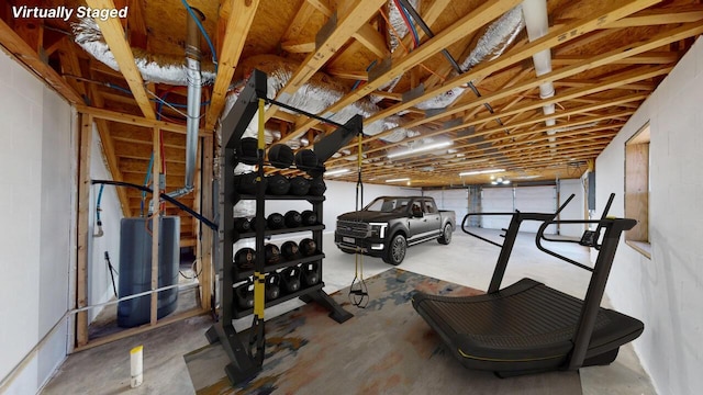 workout room with gas water heater