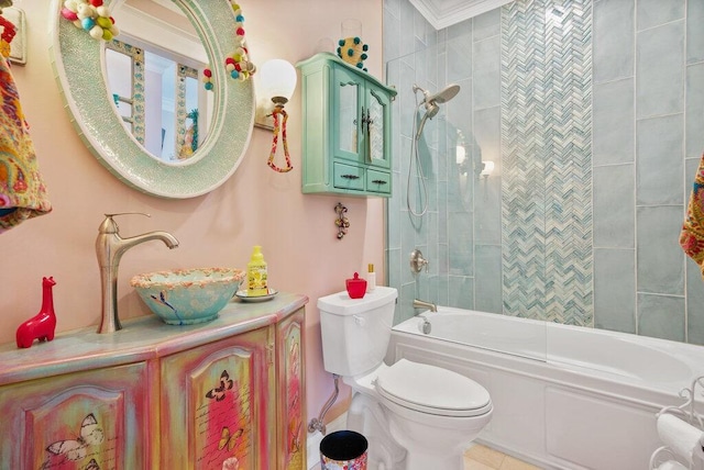 bathroom with toilet, tile patterned floors, shower / washtub combination, and vanity