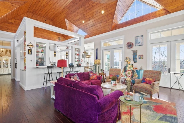 living area featuring high vaulted ceiling, french doors, wooden ceiling, and a healthy amount of sunlight