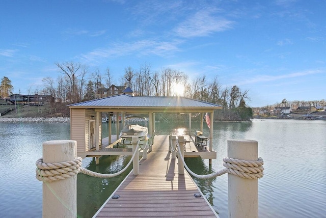 view of dock with a water view and boat lift