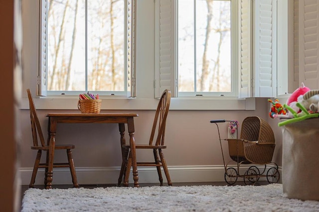 dining space with baseboards