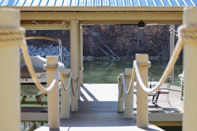 view of dock with a water view